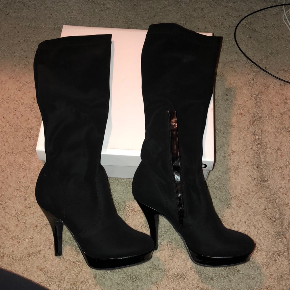 Unlisted black knee high heeled boots